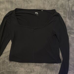 cute black bro top with a small line of ribbing down the middlele